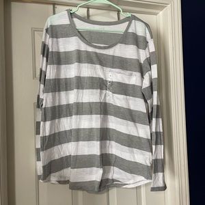 Gray and white striped t shirt.